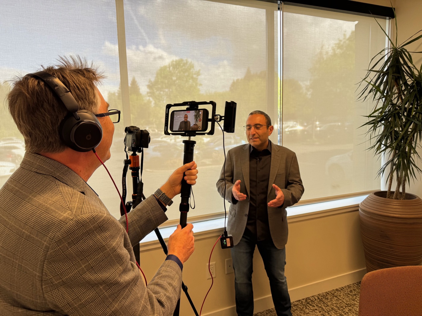 Behind the scenes on a NextGenInfra video shoot with an executive interview subject.